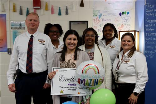 Nicole Szydlowski with Staff